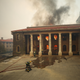 Firefighters battle flames as the library at UCT.